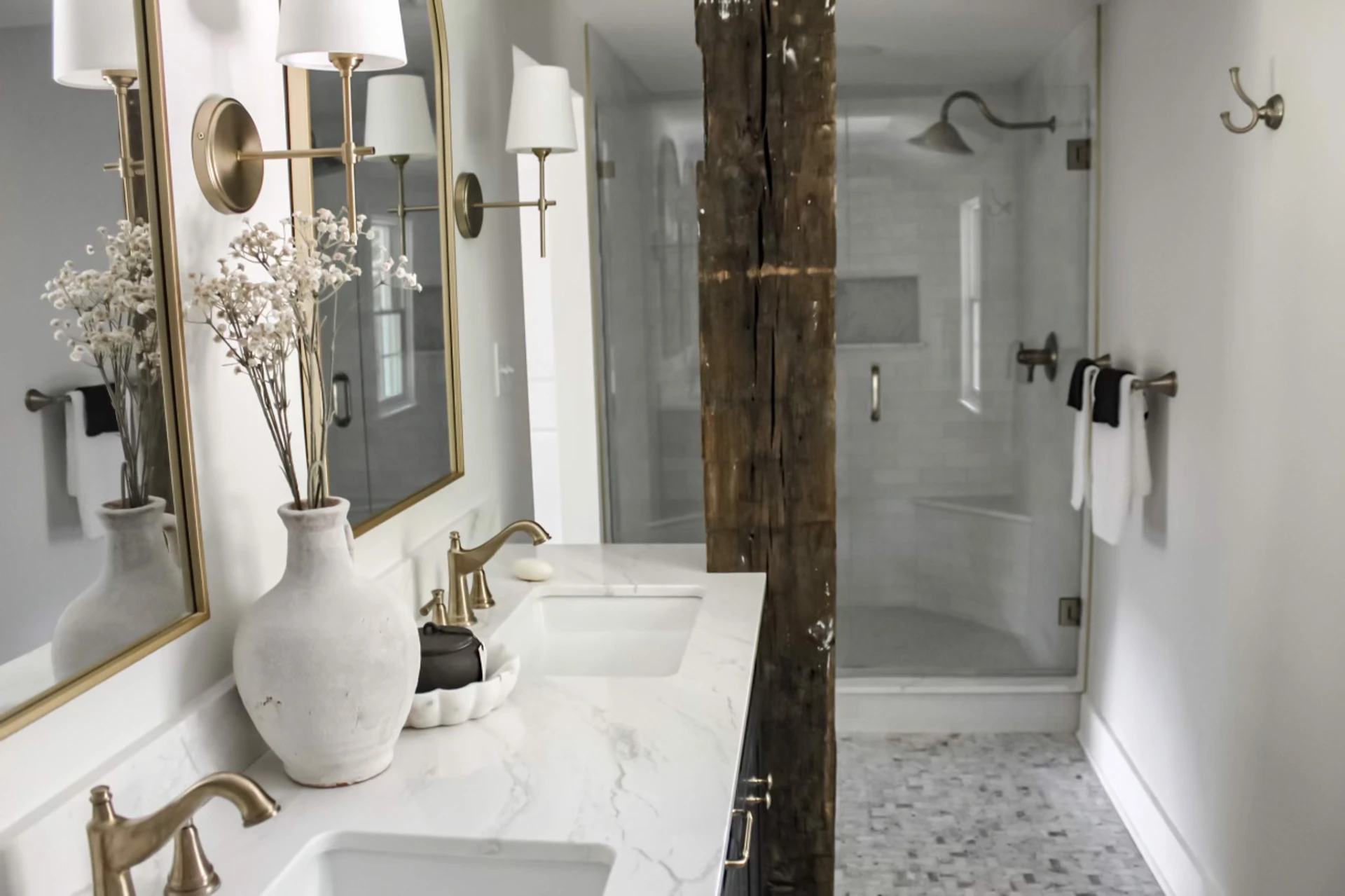 Bathroom remodel silver lake oh quartz countertop four inch backsplash structural post double vanity double corner benches curb in shower brass edge vanity shelves extended backsplash undermount sink widespread faucet scones