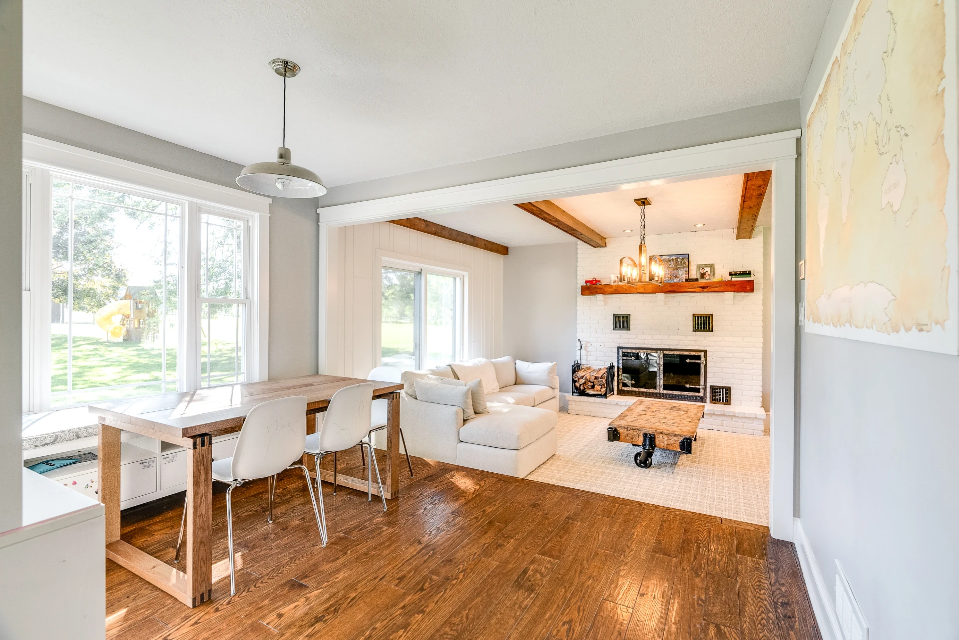 Home Remodel Hudson Oh Exposed Beams Fireplace Livingroom Wood Floor