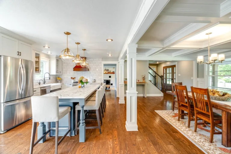 Home Remodel Hudson Oh Custom Cabinetry Quartz Countertop Bar Seating Stovetop Dining Room Staircase