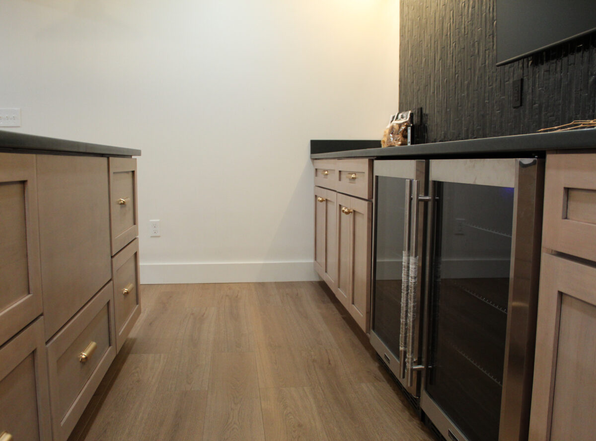 basement-remodel-strongsville-oh-quartz-countertop-black-subway-tile-wet-bar-wine-cooler (3)